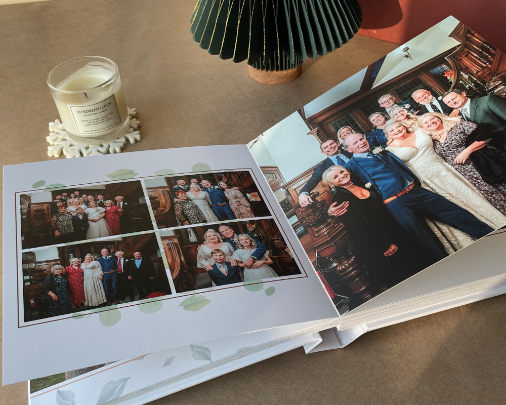 Family photos displayed in a PikPerfect layflat photo album featuring a Foliage layout style